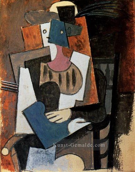 Frau au chapeau a plume assise dans un fauteuil 1919 kubist Pablo Picasso Ölgemälde